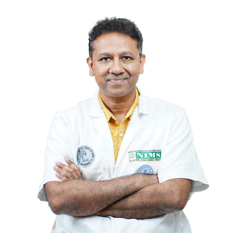 Dr. Nishad A